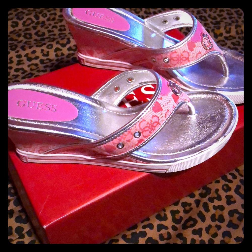 Guess pink sandal wedge size 7 1/2. Worn twice.